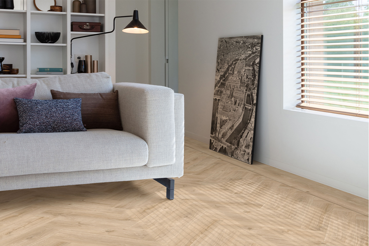 A contemporary living room featuring a chevron patterend floor from Moduleo